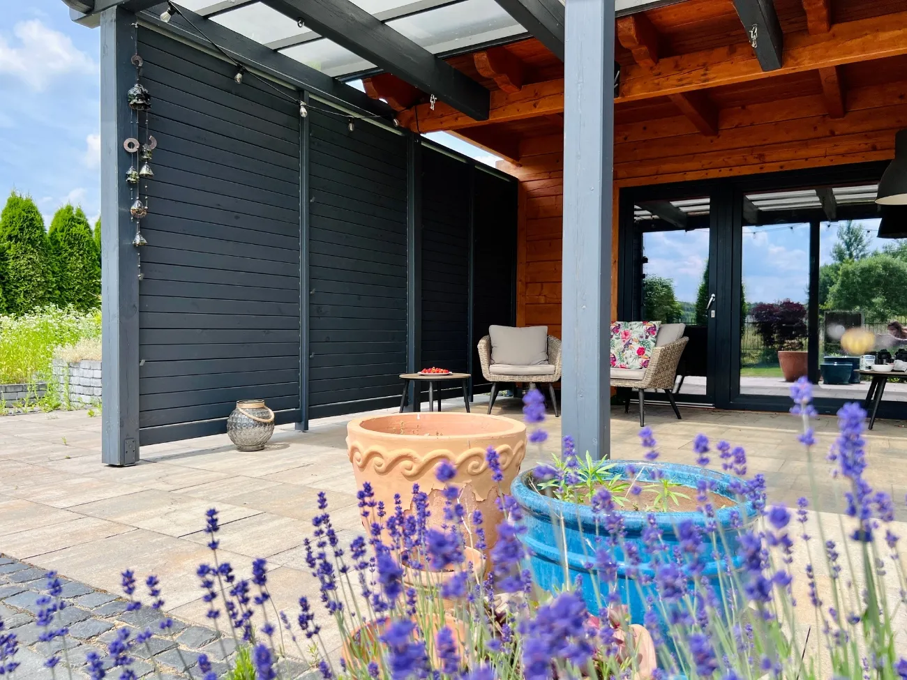 Brown aluminium terrace shutter system.